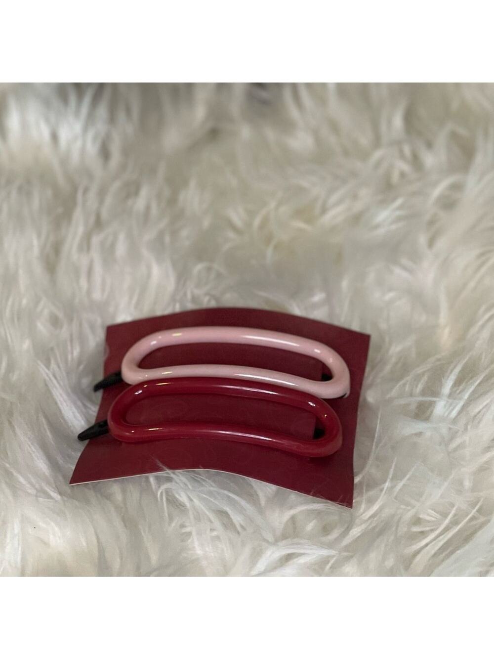 Pink Makeup Eraser hair clips. Brand new, never used. Unopened.